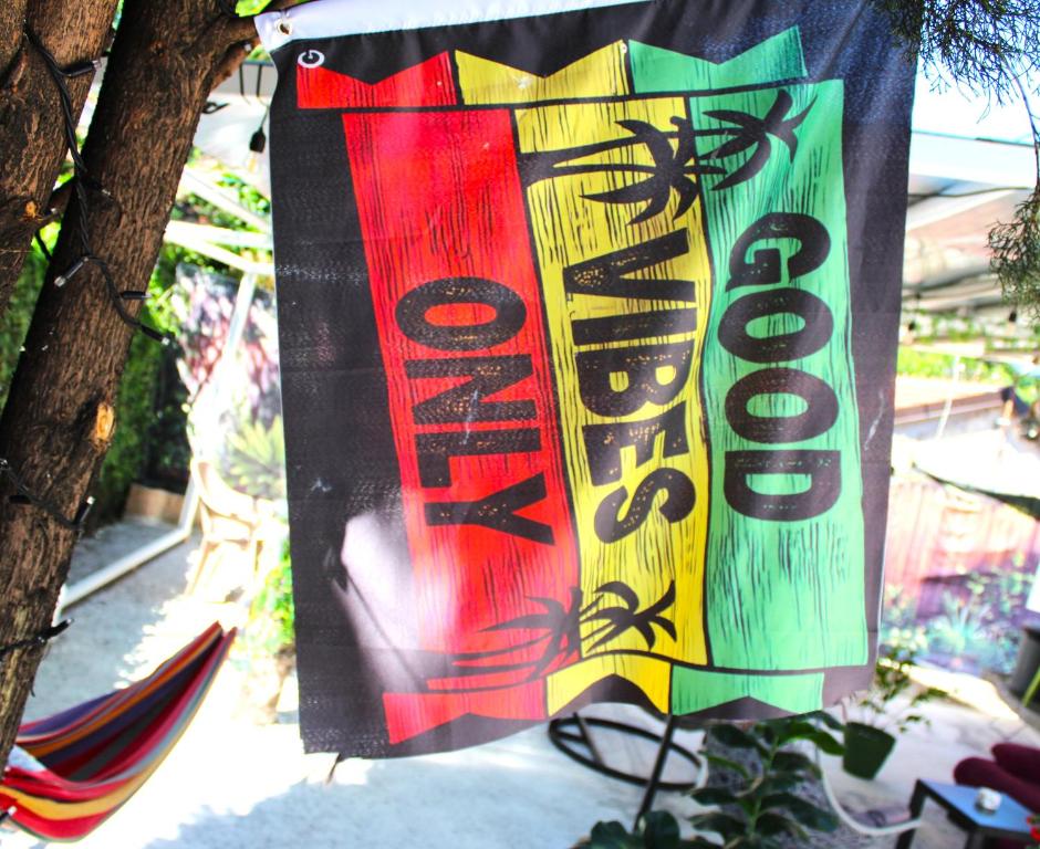 a banner that is hanging on a tree at TravelBreak in Podgorica