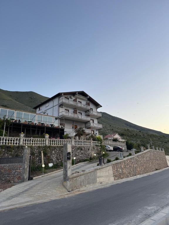 a building on the side of a road at Bella Vista in Shkodër
