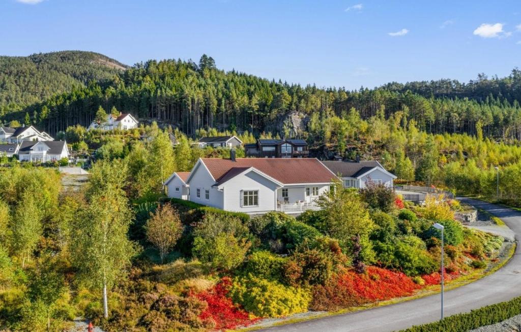 an aerial view of a house on a hill with trees at Villa Nygård in Jelsa