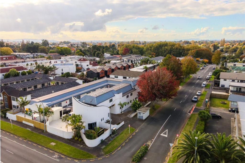 an aerial view of a town with a street at Te Awa Suites in Hamilton