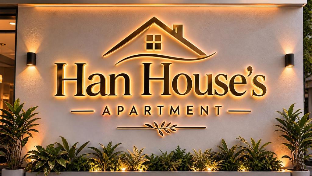 a sign that reads ham houses appointment on a wall at Han House's Apartment in Danang