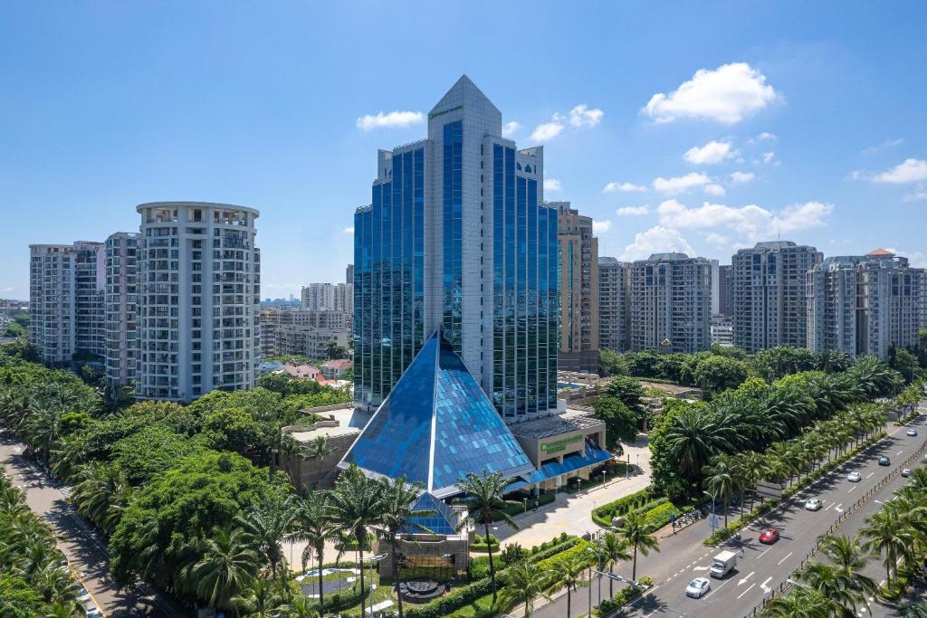an aerial view of a city with tall buildings at Wyndham Garden Haikou Meilan in Haikou