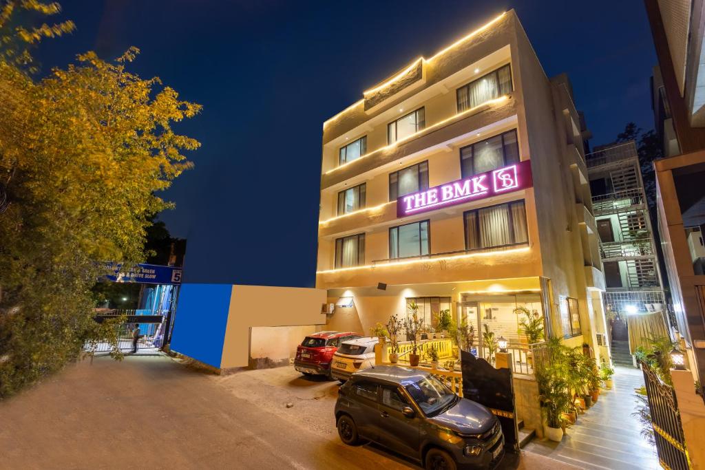 a building with a sign that reads the daily at Foxoso The BMK - A Corporate Hotel in New Delhi