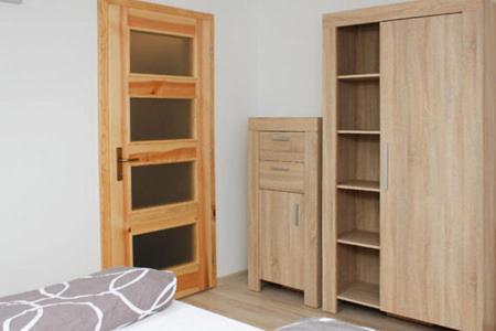 Postel nebo postele na pokoji v ubytování Penzion Réva