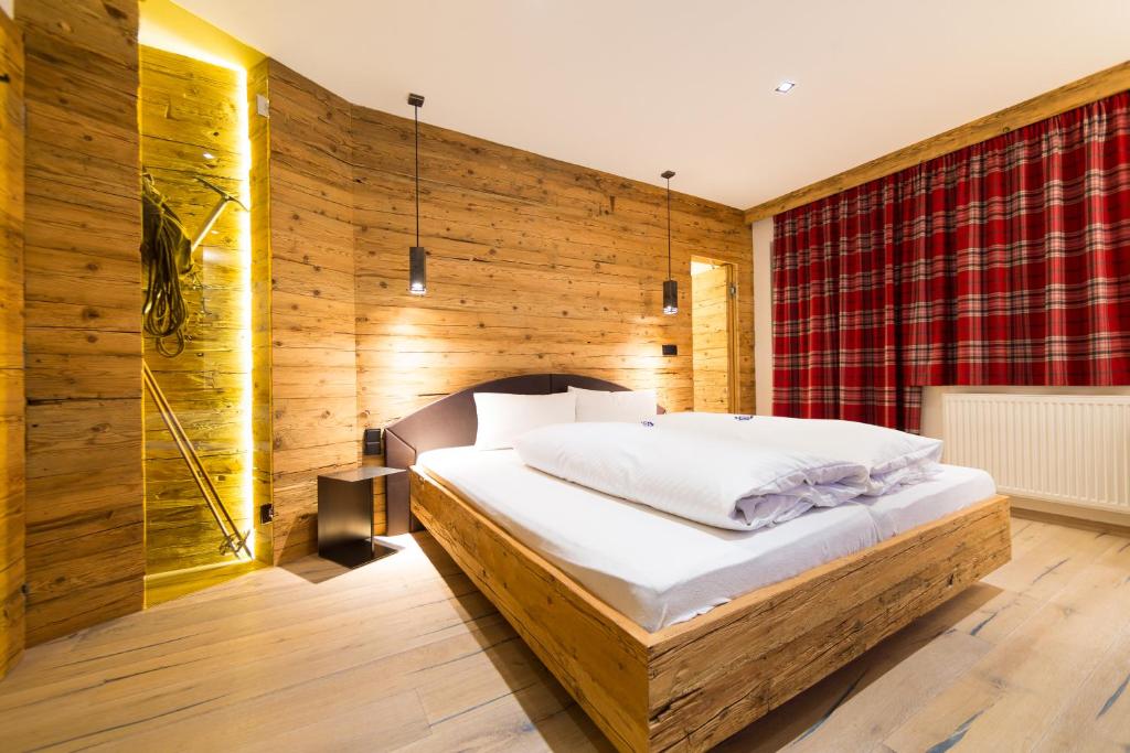 Postel nebo postele na pokoji v ubytování Ferienhaus Alpina