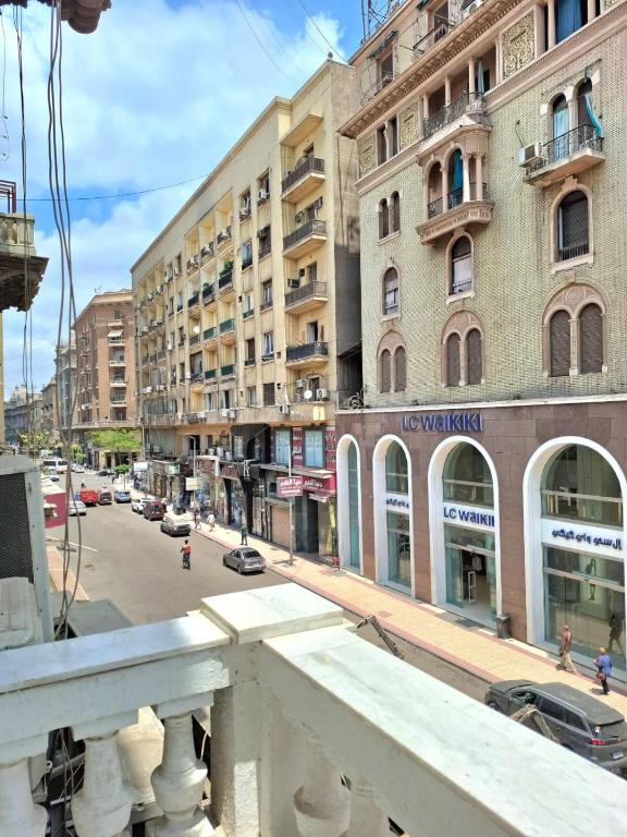 a view of a city street with tall buildings at Hotel velvet One in Cairo