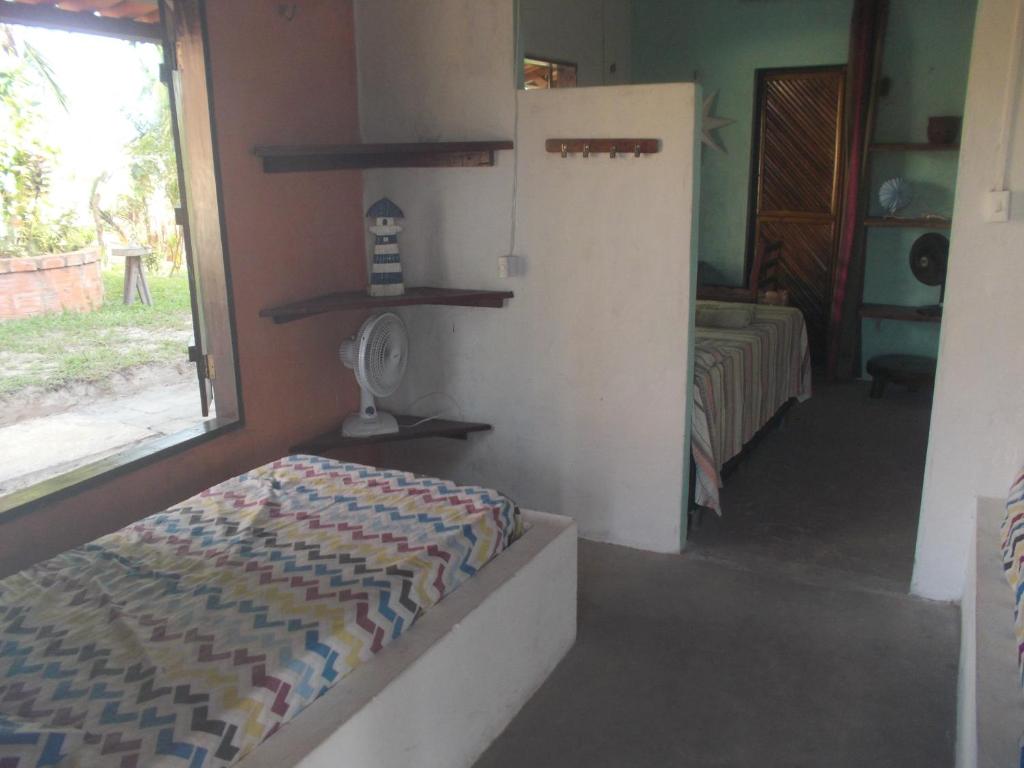Uma cama ou camas num quarto em Pousada Mirage Atins
