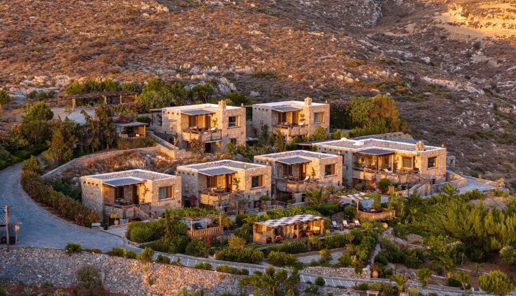 an aerial view of a house in the mountains at Terra Minoika Boutique Resort in Kato Zakros