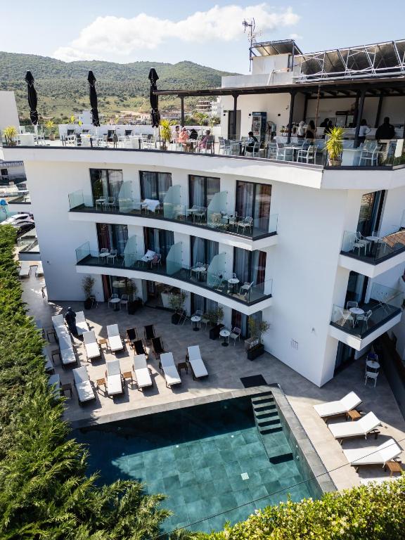 an aerial view of a hotel with a swimming pool at Blue Eye Hotel in Ksamil
