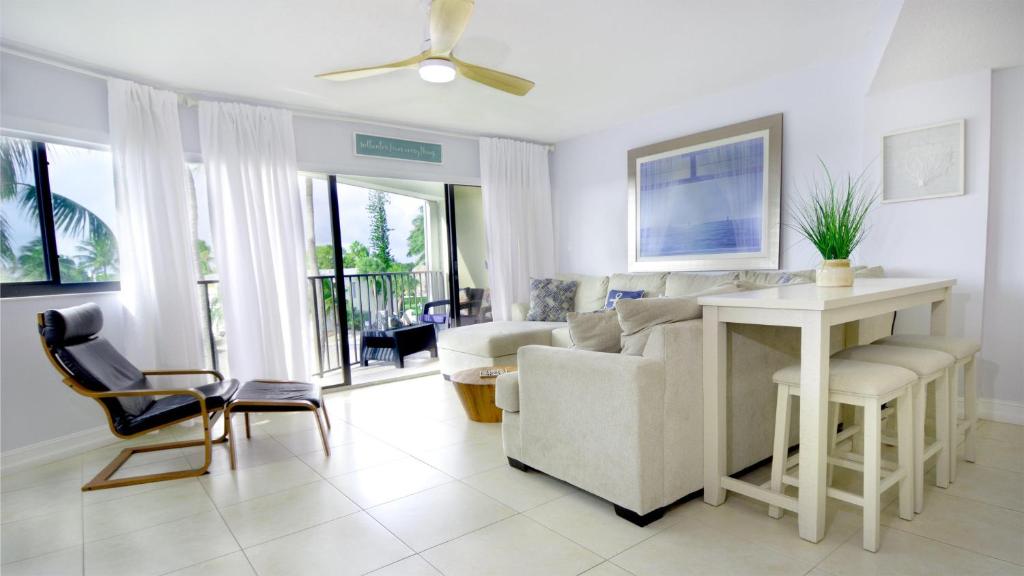 a living room with a couch and a table at 305 Kawama Tower in Key Largo
