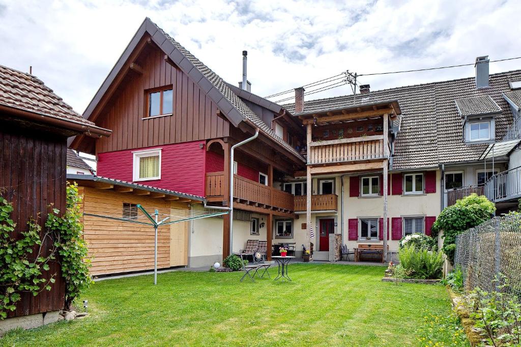 a large house with a yard in front of it at Haus Belchenwind in Münstertal