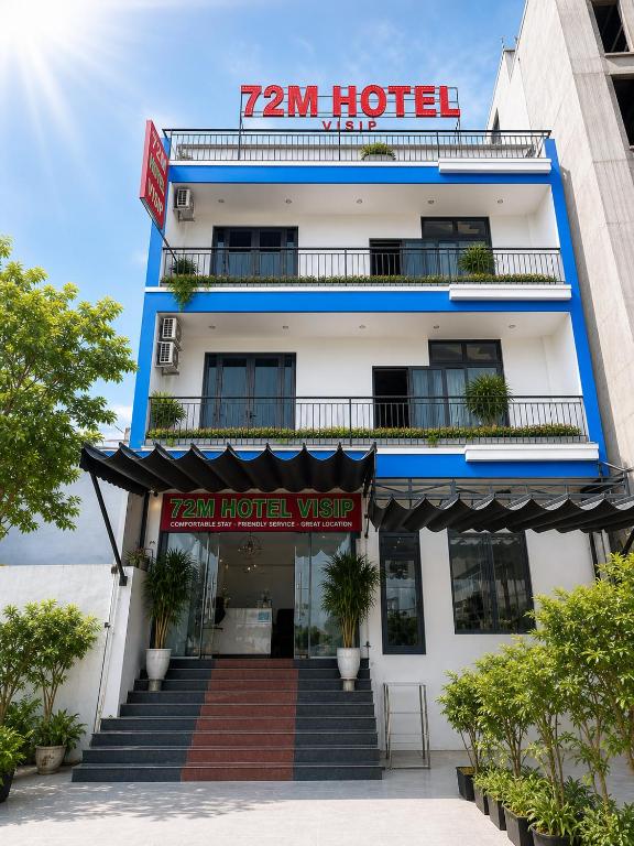 a hotel with a sign that reads hotel at 72M Hotel Visip in Vinh