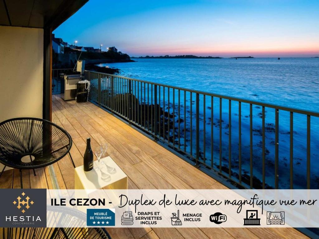 a view of the ocean from a balcony at ILE CEZON - Duplex de luxe avec magnifique vue mer in Landéda