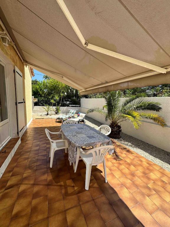 Maison de plage avec jardin clos