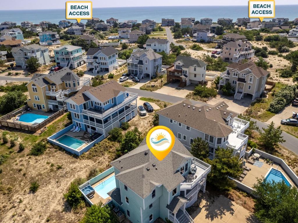 an aerial view of a villa with houses at 1008 - Shellous in Corolla