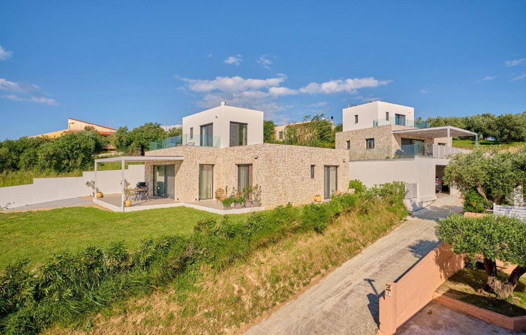 an aerial view of a house with a driveway at Arillas Villas in Arillas