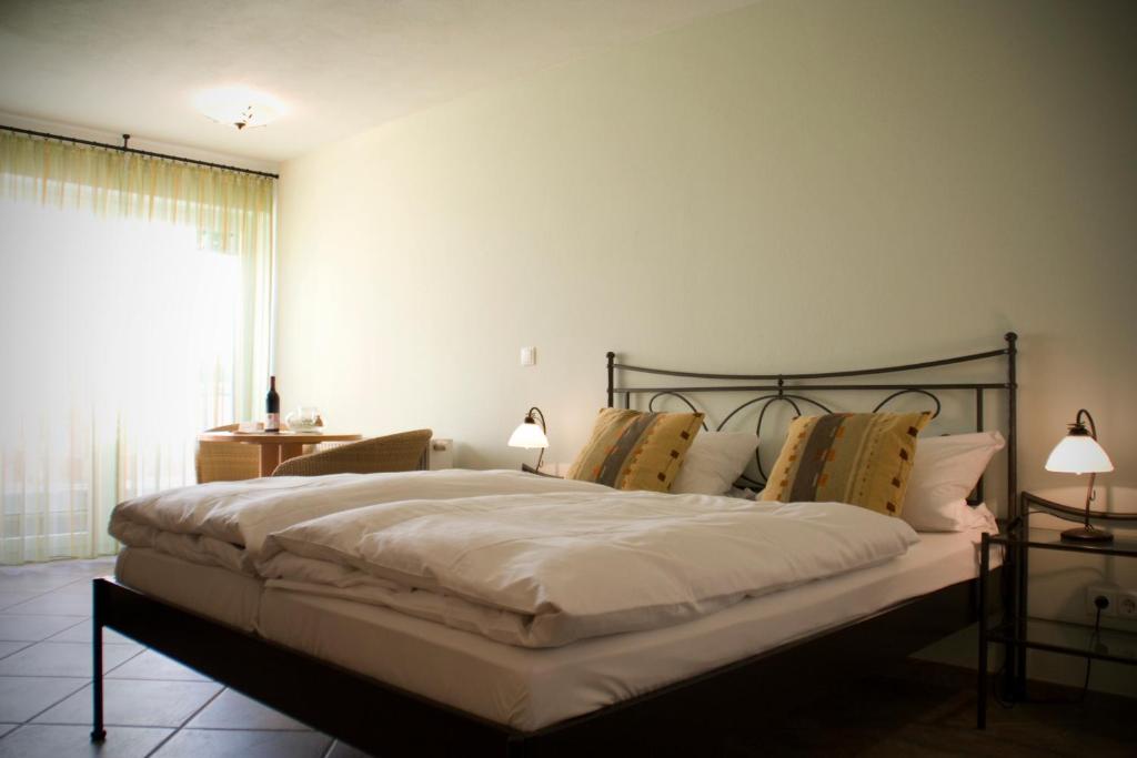 Postel nebo postele na pokoji v ubytování Porta Vinea