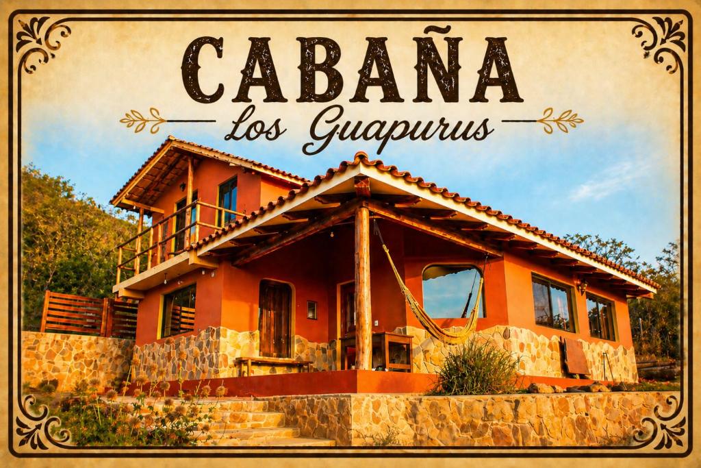 a house with the words cacienda los guatemalis at Cabaña Los Guapurús in Samaipata