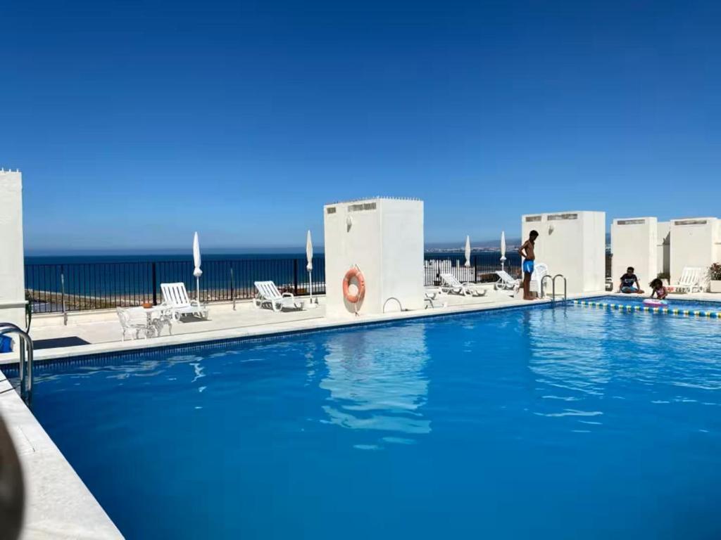 Apartamento acolhedor frente mar com piscina