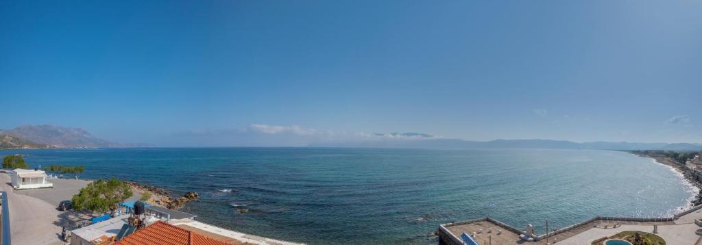an aerial view of a beach and the ocean at Argo Rooms-Papadakis in Kissamos