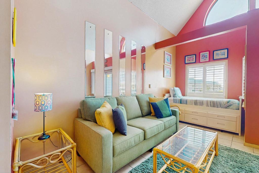 a living room with a couch and a bed at Plantation West #1365 in Fort Morgan