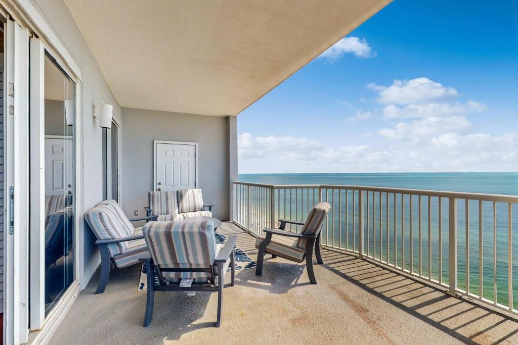 Penthouse-level waterfront condo with epic Gulf-view balcony pools & gym