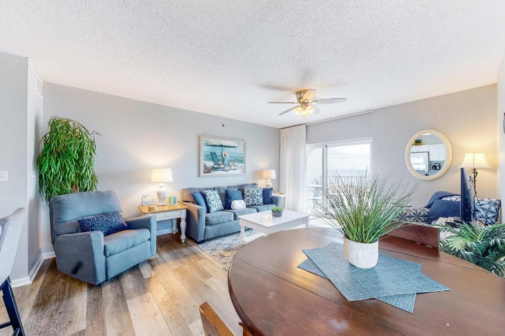 Gulf front corner condo w a private balcony plus a shared beachside pool