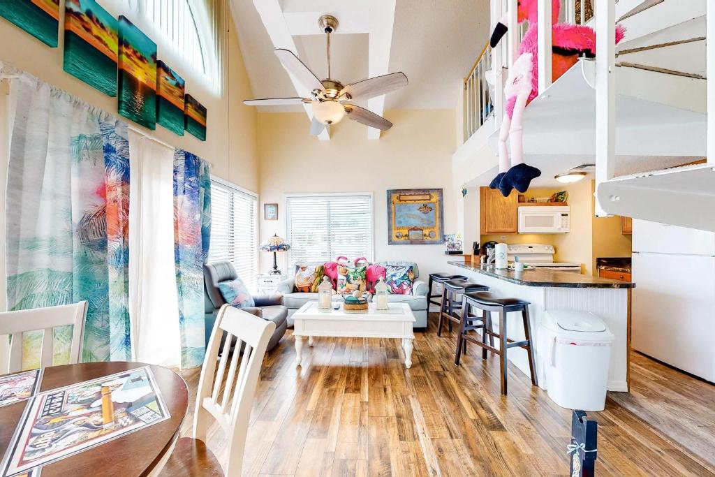a living room with a couch and a table at Plantation West #1354 in Gulf Shores
