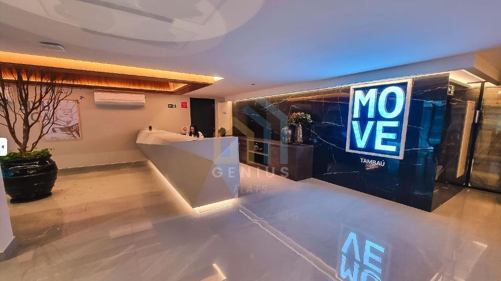 a lobby with a november sign on the wall at Move Tambaú Genius Flats in João Pessoa