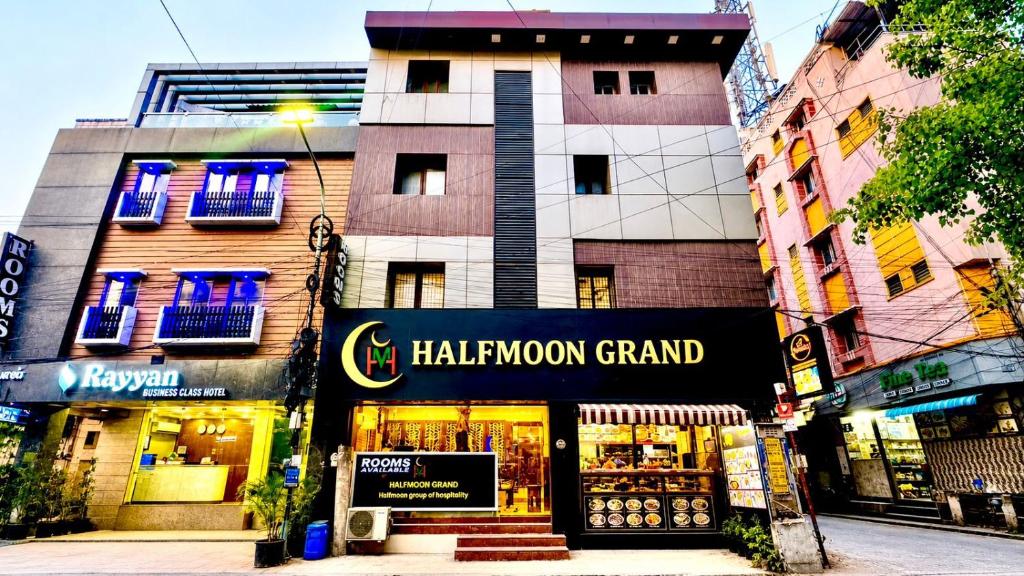 a store front of ahakushima grand in a city at Half Moon Grand in Chennai