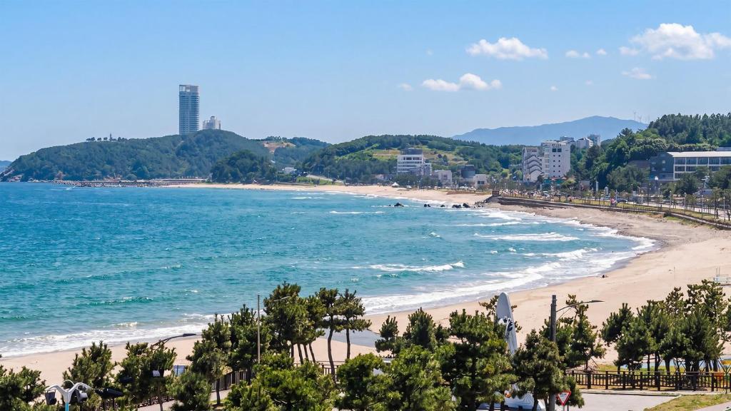 a view of a beach and the ocean at Yangyang J Ocean View in Yangyang