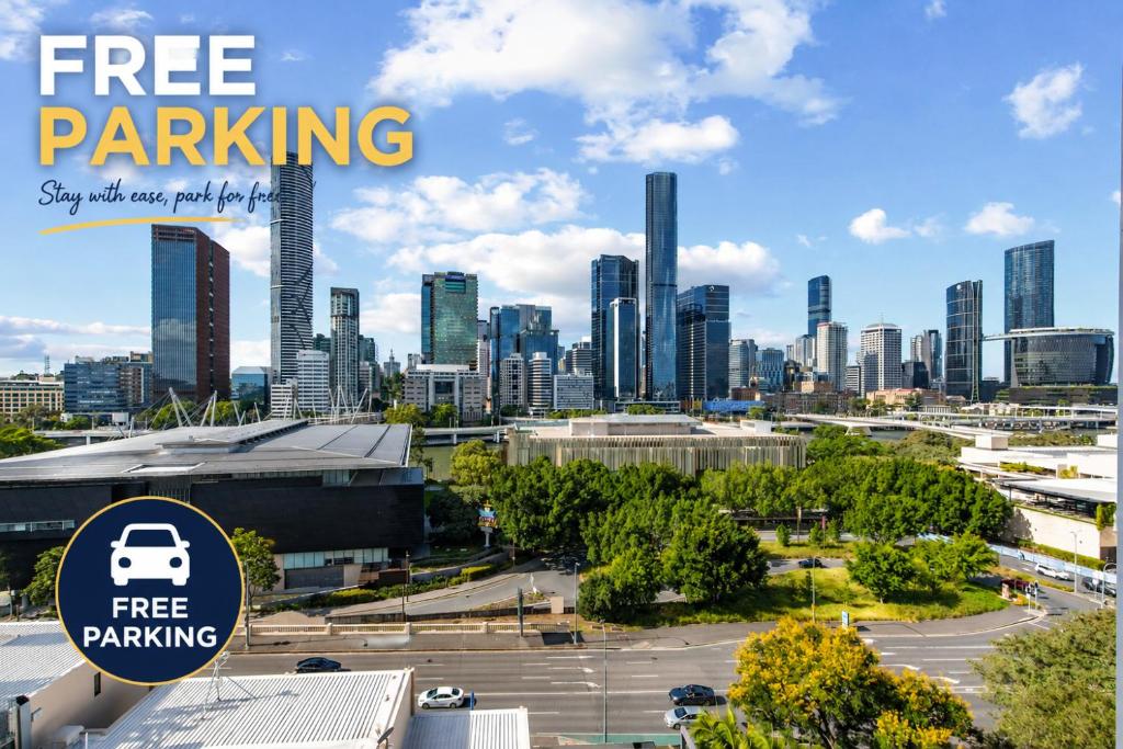 a view of a city with a free parking sign at Brisbane Skyline View 2Beds River view Apt in Brisbane