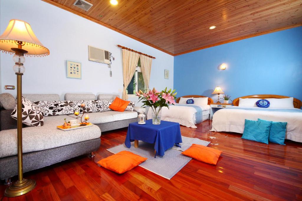 Postel nebo postele na pokoji v ubytování Zhen Shan Zhuang B&B