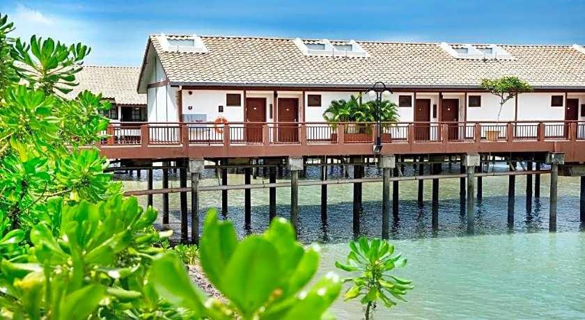 a house on a pier over the water at Brassalova Signature Stay in Port Dickson