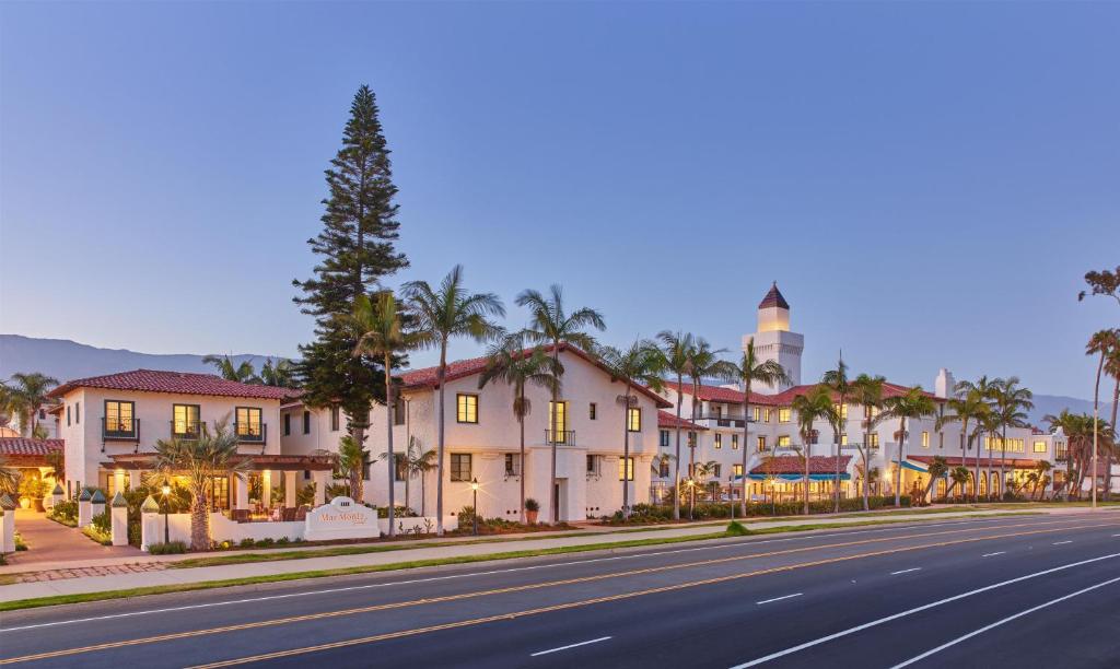 an empty street in front of a large house at Mar Monte Hotel, in The Unbound Collection by Hyatt in Santa Barbara