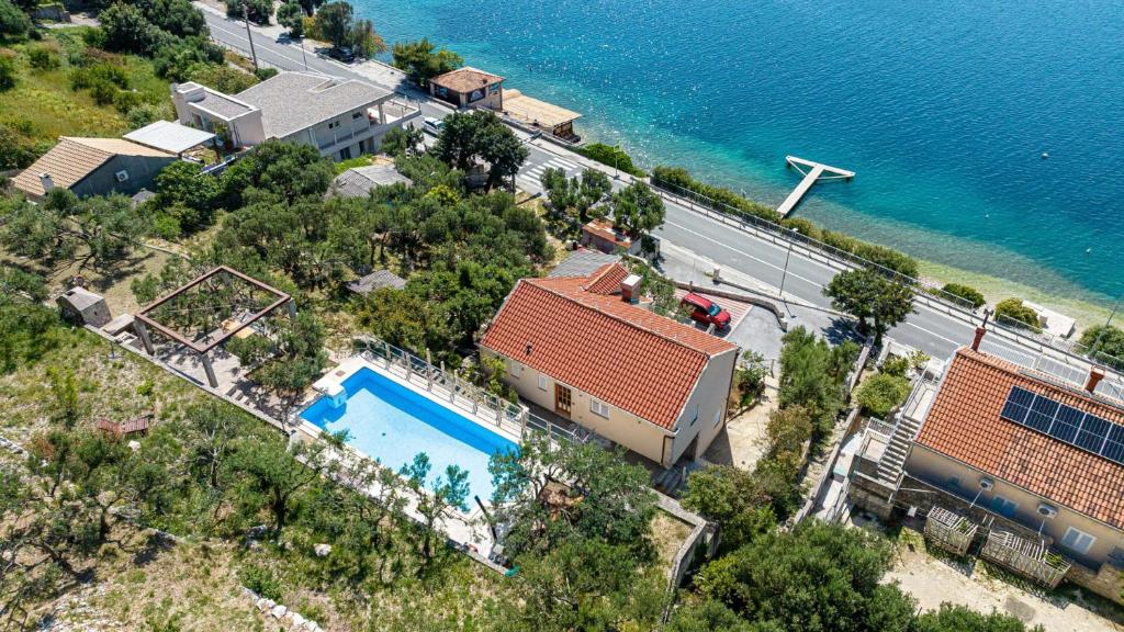 an aerial view of a house with a swimming pool at Villa Matej by Villas Guide in Zaton