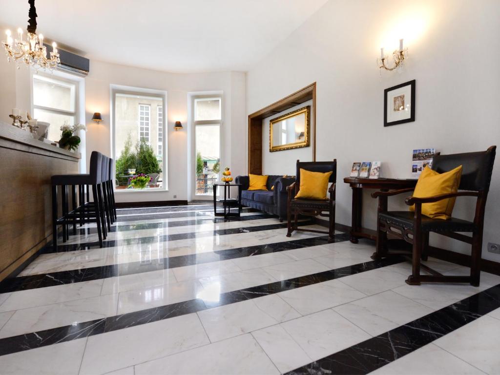 Posedenie v ubytovaní Grottger Luxury Boutique Hotel City