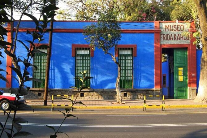 a blue building on the side of a street at Hotel Frida in Mexico City