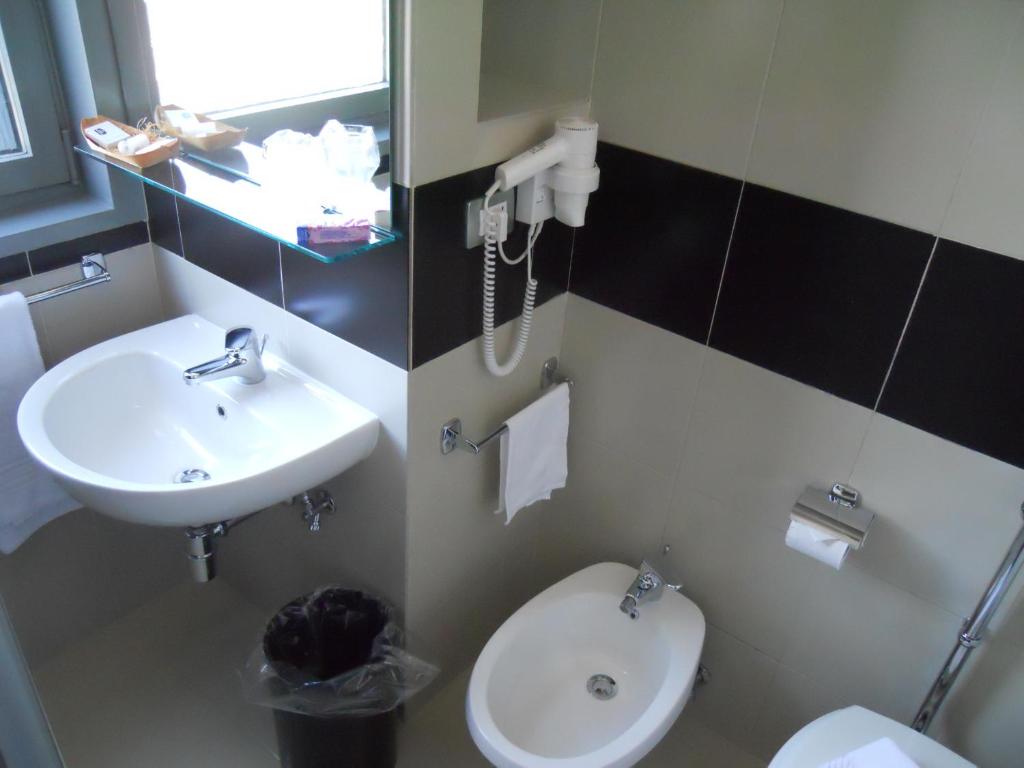 Koupelna v ubytování Executive Business Hotel