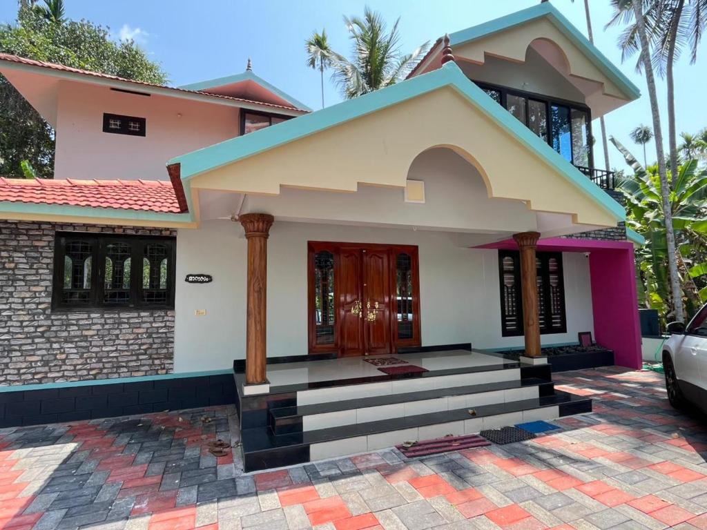 a small house is characteristic of this at Manasam Homes Near To IIM & NIT - kOZHIKODE in Kunnamangalam