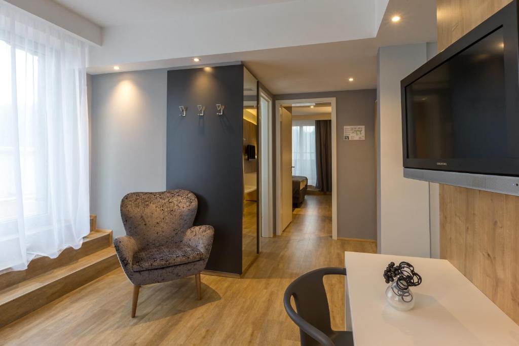 TV in/ali zabaviščno središče v nastanitvi M Hotel