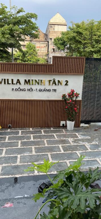 a sign for a millina mine firm on a fence at Minhtan2 villa in Dong Hoi
