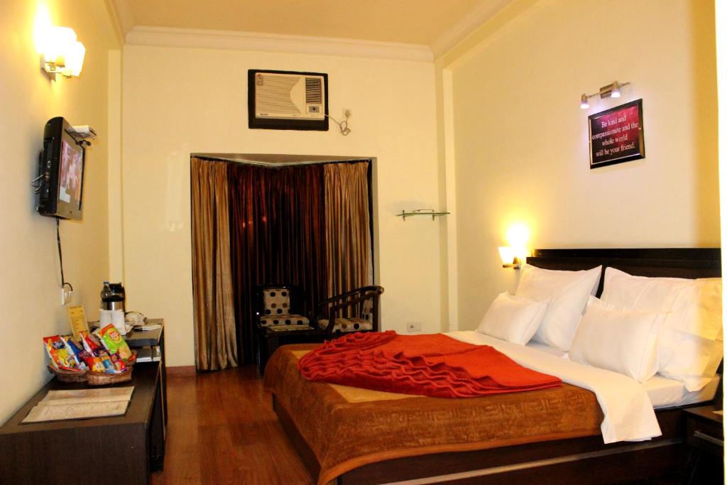 Postel nebo postele na pokoji v ubytování Hotel Hong Kong Inn