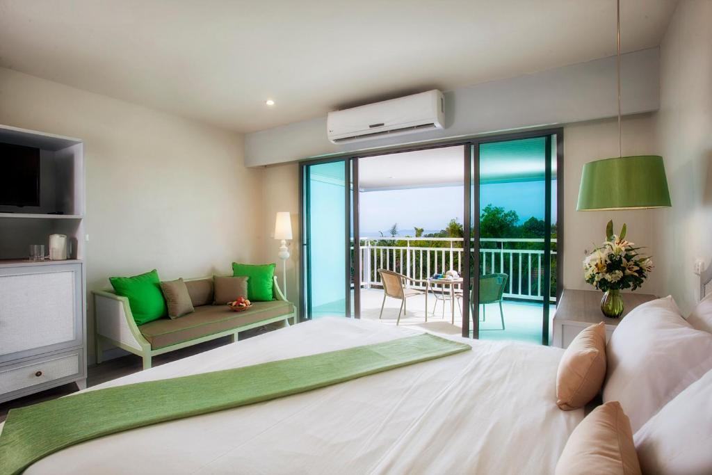 Postel nebo postele na pokoji v ubytování Bandara On Sea, Rayong
