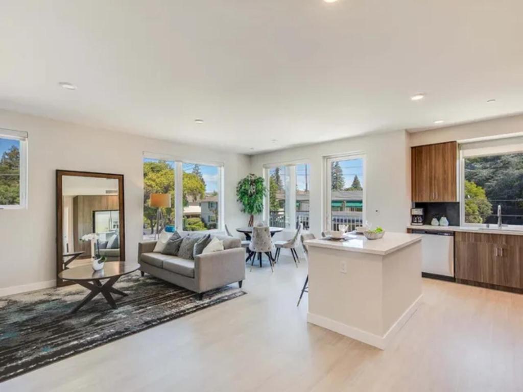 a living room with a couch and a table at Realm in Menlo Park