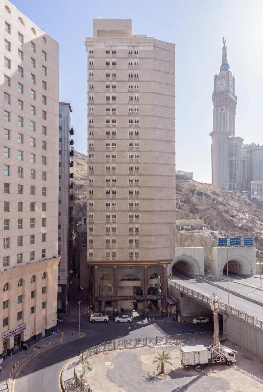 a view of a city with tall buildings at Wahet Al Deafah Hotel in Mecca
