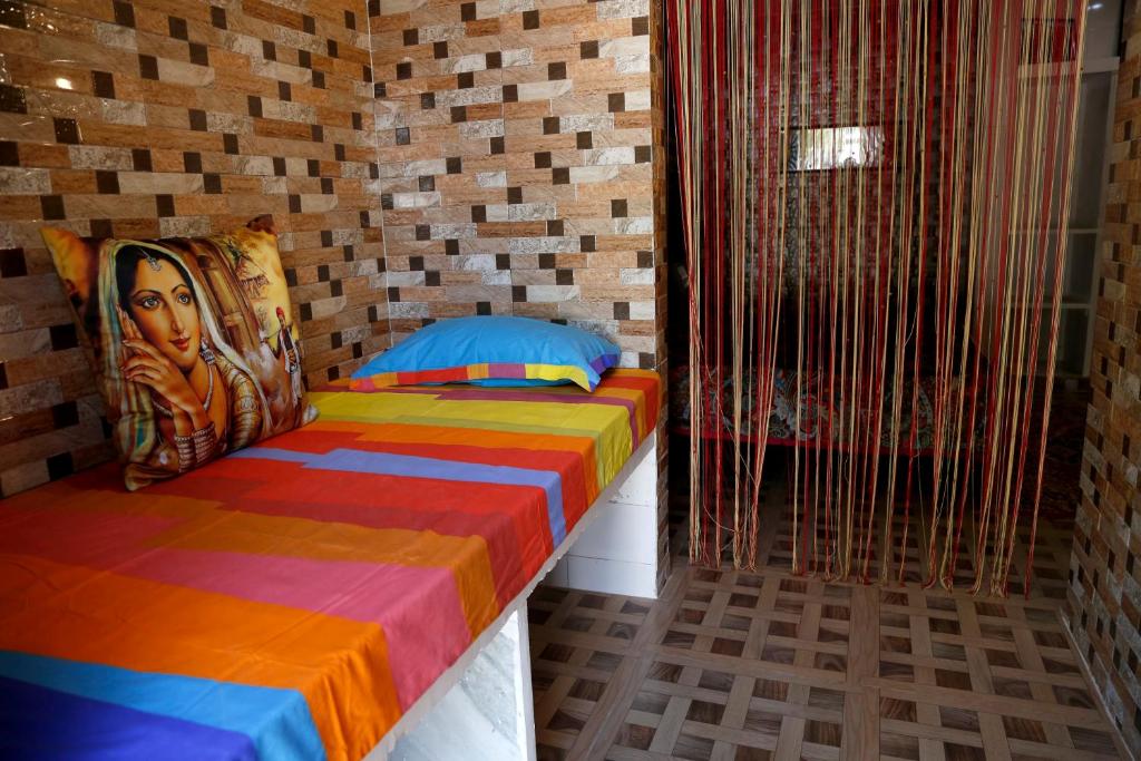 Postel nebo postele na pokoji v ubytování Pushkar Cooking Art and Home Stay