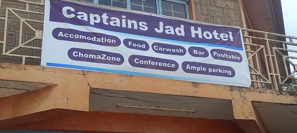 a sign for a hotel on the side of a building at Jad Captains Hotel in Machakos