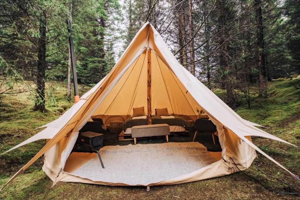a tent in the middle of a forest at Hraunborgir Golden Circle Tents in Kiðjaberg