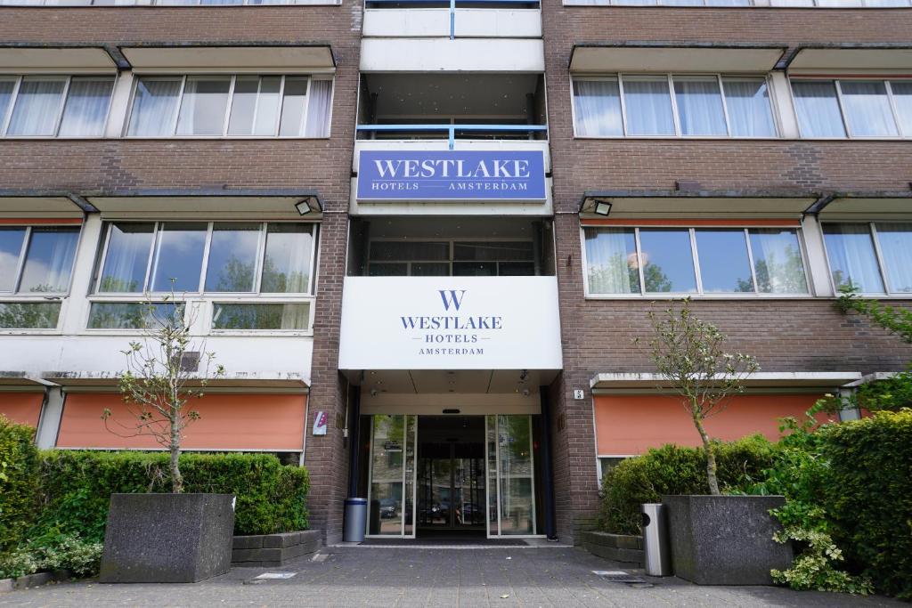 a building with the entrance to the westlake entrance at Westlake Hotels Amsterdam in Amsterdam